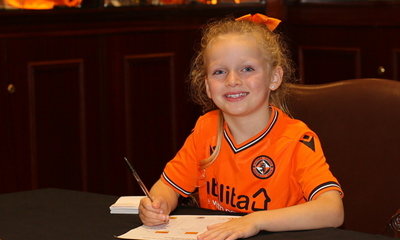 Picture showing one of the girls joining the Girls' Academy